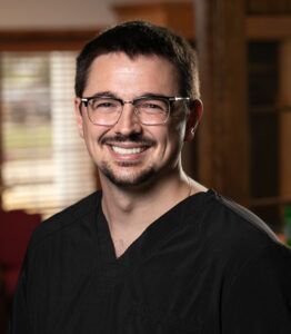 Portrait of Dr Parker Roustio